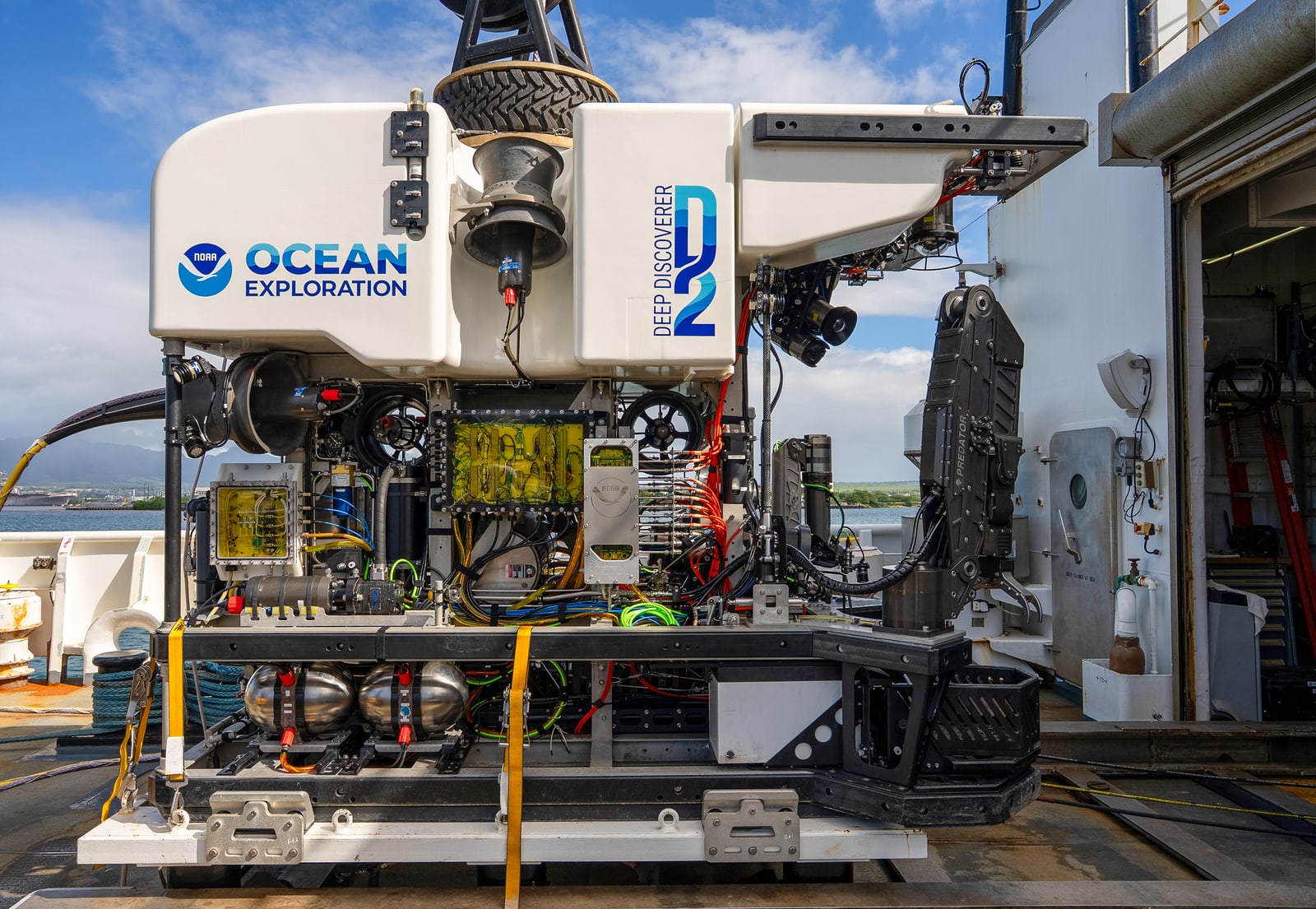 The white remotely operated vehicle Deep Discoverer secured on a research ship’s deck.
