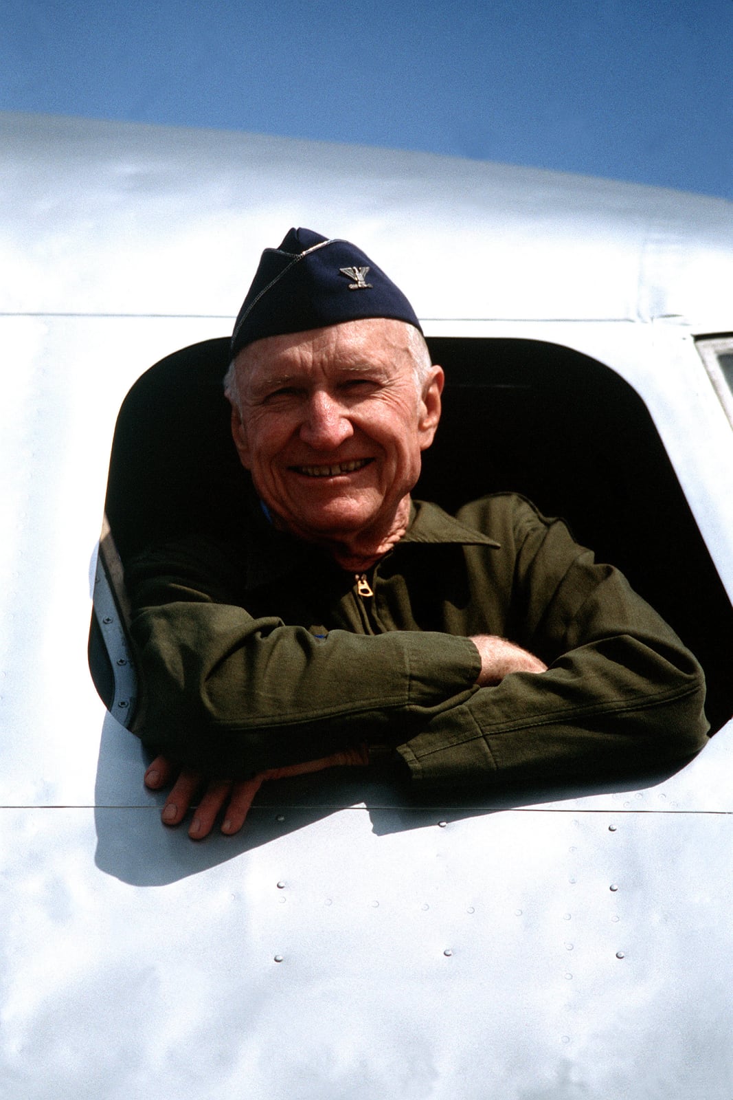 A later commemorative portrait of Gail Halvorsen leaning from a C-54 static display; the exact year is not asserted.