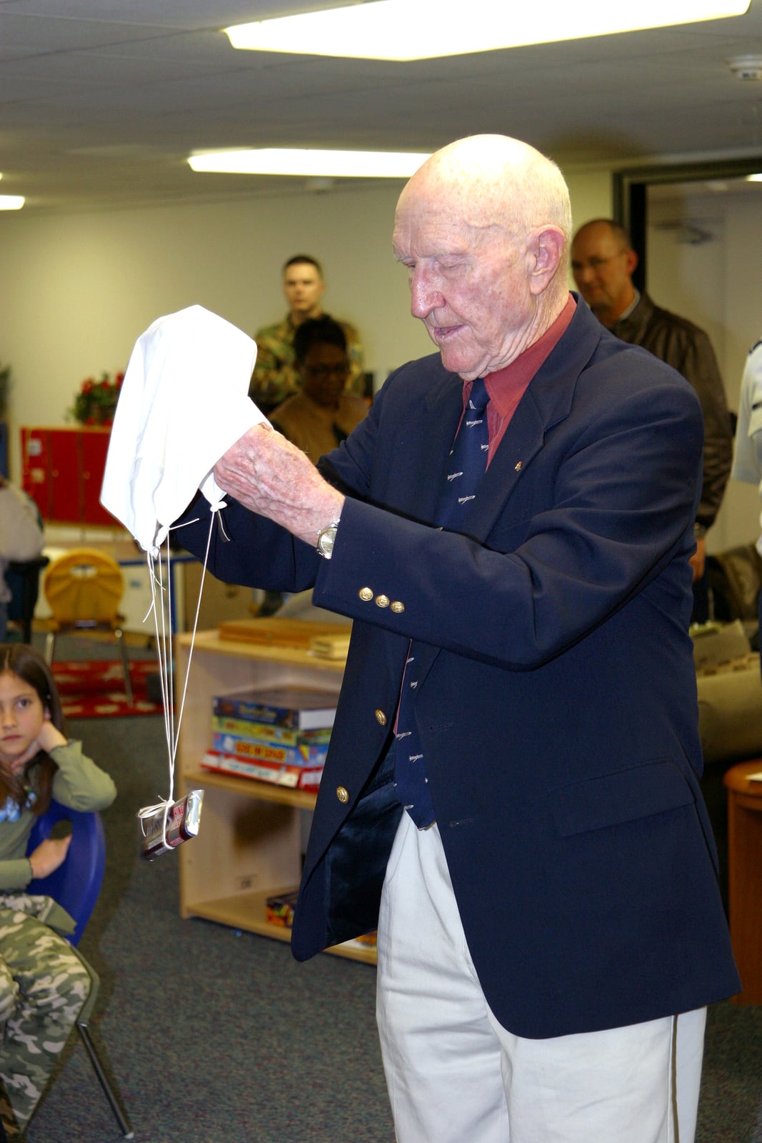 Gail Halvorsen demonstrating a candy parachute at Pope Air Force Base on February 22, 2006.